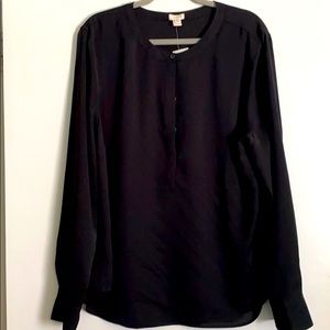 Nice Black Blouse with shirt tail hem.